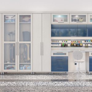 Custom garage design with high-gloss blue cabinets, frosted glass doors, and a slat wall organizer