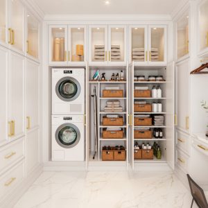Custom laundry room with gold hanging rod, glass door cabinets, and concealed laundry storage