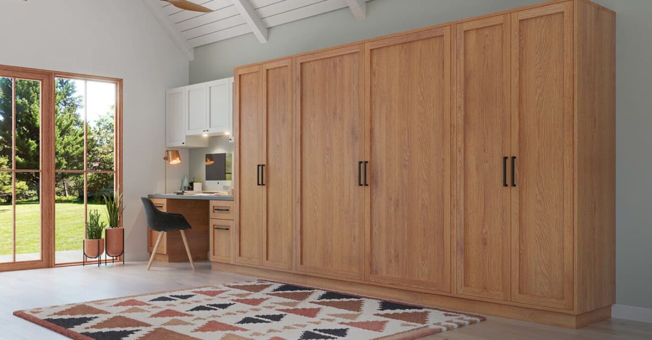 Wall bed with integrated storage and workstation