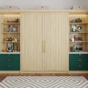 Light woodgrain wall bed closed with flanking green drawer units and open shelving for accessories and décor.