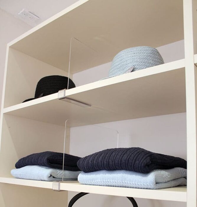 Movable clip on Lucite shelf dividers