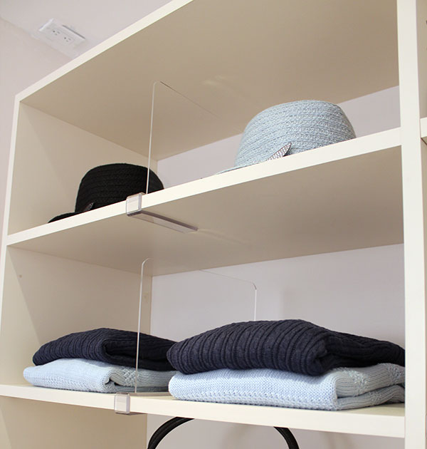 Movable clip on Lucite shelf dividers