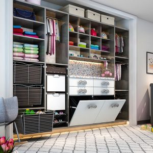 Closet system with built-in changing station and pull-down hampers.