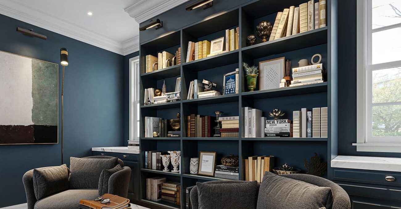 Built-in bookcases with library lighting and crown molding.