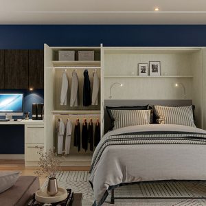 Wall bed with integrated work station, goose neck lighting, LED hanging rods, and dual-tone cabinets.
