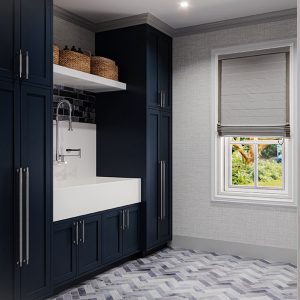 Full height cabinetry with built-in laundry sink and open shelving for woven baskets.