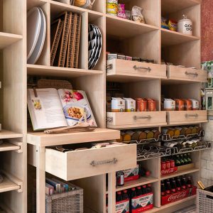 Maple walk-in pantry with cutting board cart.