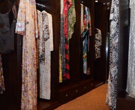 expensive designer gowns in closet